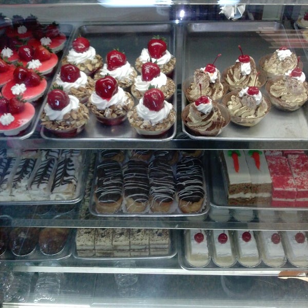 Photo taken at Circo&#39;s Pastry Shop by Jo T. on 9/22/2013