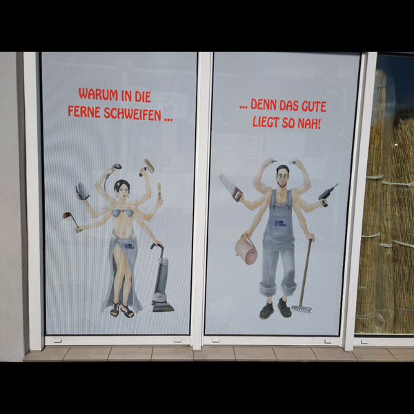 Awful sexist commercial on the shopfront. 😠🙈