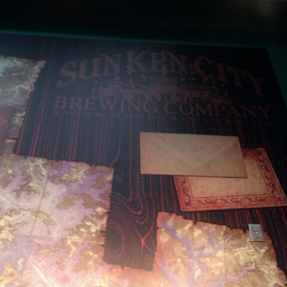 Photo taken at Sunken City Brewing Company and Tap Room by Vanessa H. on 5/10/2013