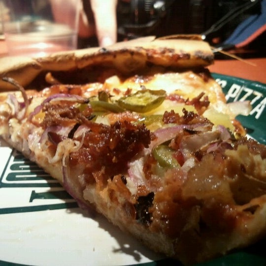 Photo taken at Woodstock&#39;s Pizza by Phil R. on 2/15/2013