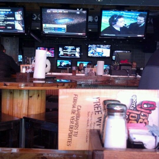 Photo taken at Ojos Locos Sports Cantina by Colin G. on 1/18/2012