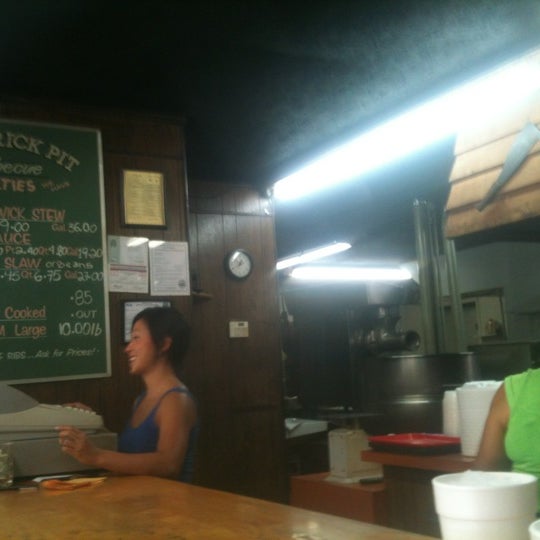 Photo taken at Old Brick Pit Barbecue by Wesley B. on 8/10/2012