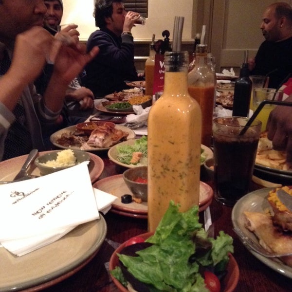 Photo taken at Nando&#39;s by Emad A. on 12/30/2013