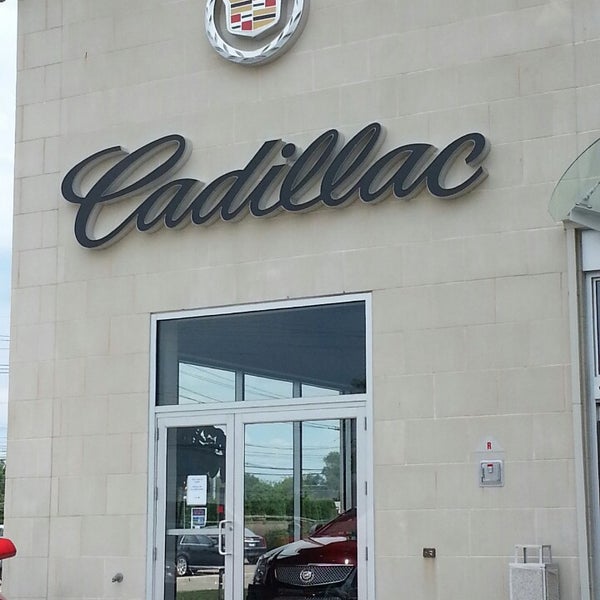Photo taken at Holman Cadillac by Jackie D. on 7/31/2013