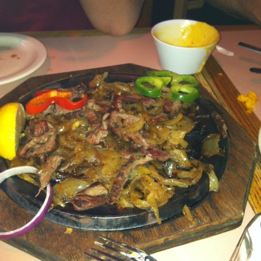 Photo taken at Fajitas: A Sizzlin&#39; Celebration by Tara W. on 11/22/2012