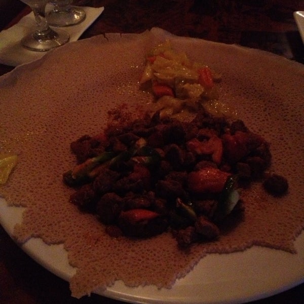 Photo taken at Queen Sheba Ethiopian Restaurant by Don D. on 9/29/2013