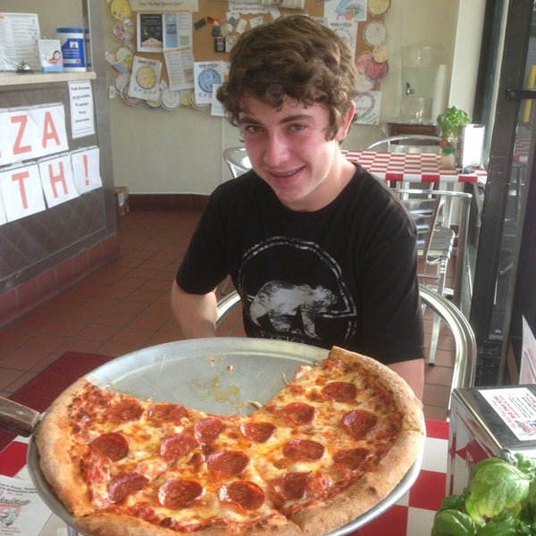 Photo taken at Valentino&#39;s Pizza and Pasta by Dan T. on 8/8/2013