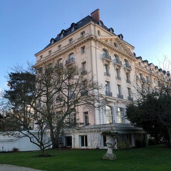 Photo taken at Waldorf Astoria Versailles - Trianon Palace by Olya M. on 12/20/2019