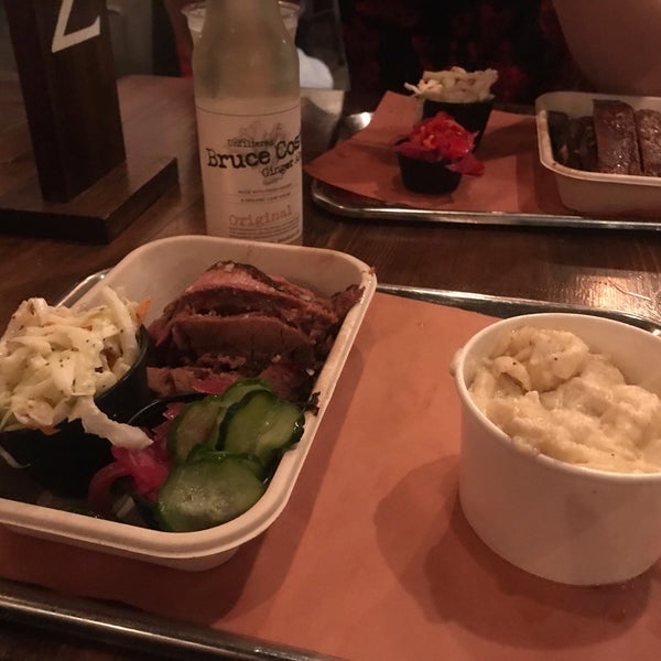 Photo taken at Mighty Quinn&#39;s BBQ by Rachel P. on 9/29/2019