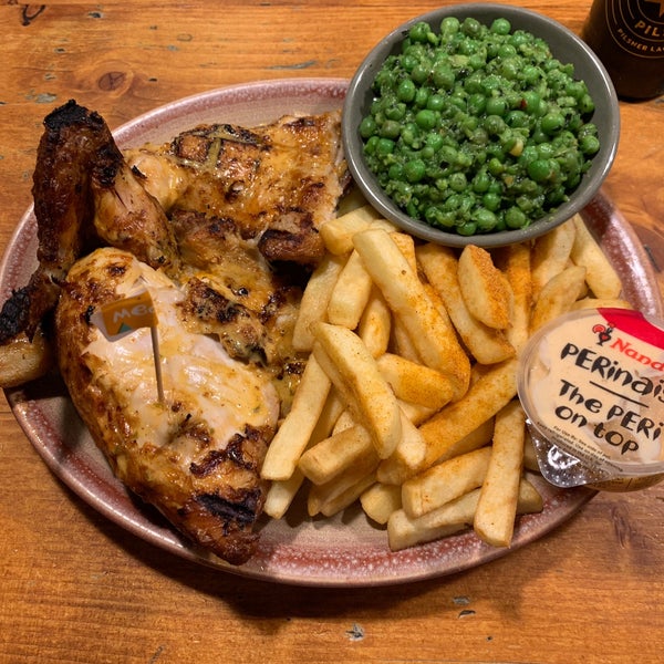Photo taken at Nando&#39;s by Andrew H. on 5/6/2019