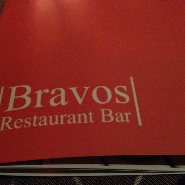 Photo taken at Bravos Restaurant Bar by Joe D. on 3/5/2014