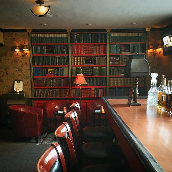 Photo taken at Beekman Bar &amp; Books by Fred P. on 5/12/2015