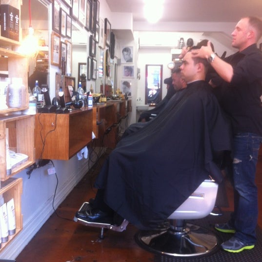 Foto diambil di Maloney&#39;s Barber Shop oleh David T. pada 10/24/2012