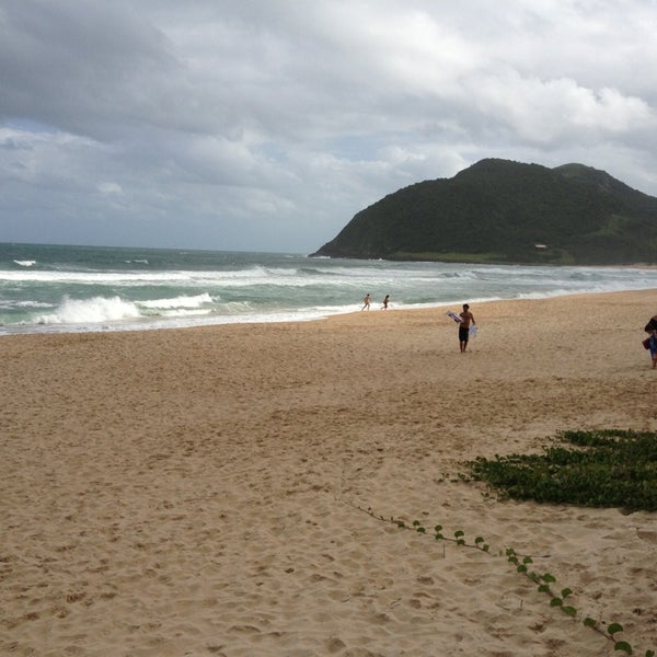 Photo taken at Praia da Silveira by Uelington B. on 1/10/2013