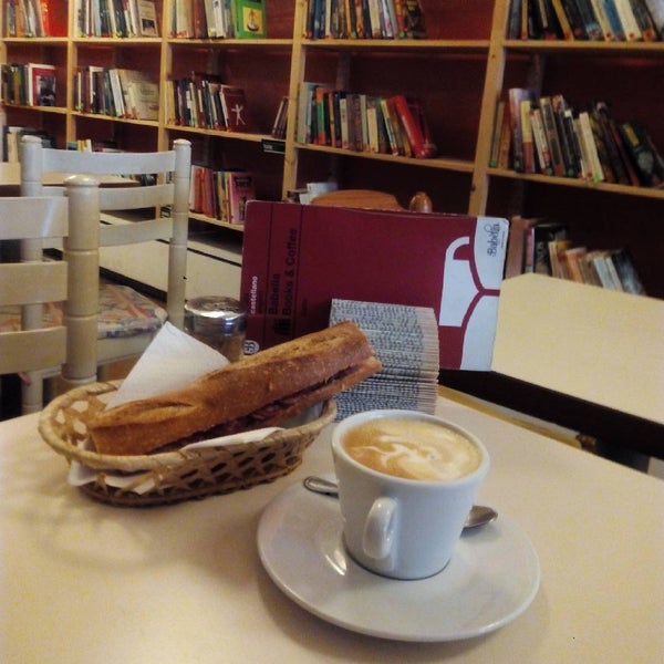Photo taken at Babèlia Books &amp; Coffee by J B. on 1/23/2016