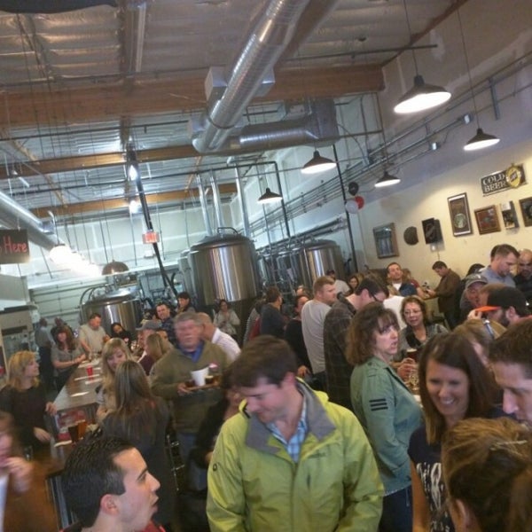 Photo taken at Eight Bridges Brewing by Brian J. on 2/7/2015