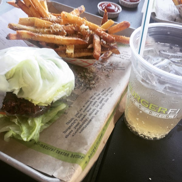 Photo taken at BurgerFi by Abby A. on 4/9/2016