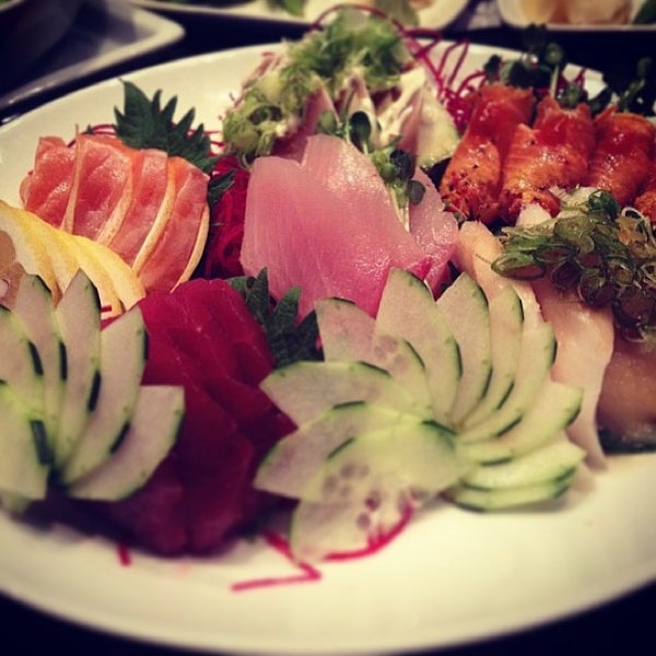 Photo taken at Toro Sushi Bar Lounge by Hiroshi M. on 3/24/2014