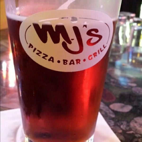 Photo taken at MJ&#39;s Pizza Bar &amp; Grill by Larry E. on 12/3/2014