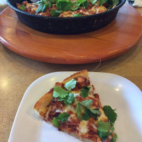 Photo taken at Classic Chicago&#39;s Gourmet Pizza by Jenny K. on 1/30/2015