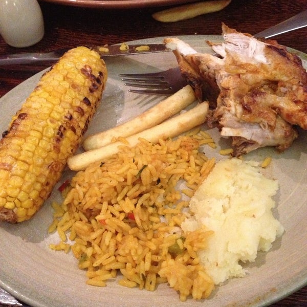 Photo taken at Nando&#39;s by Anny M. on 6/23/2013