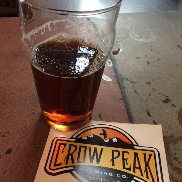 Photo taken at Crow Peak Brewing Company by Xan K. on 5/17/2019