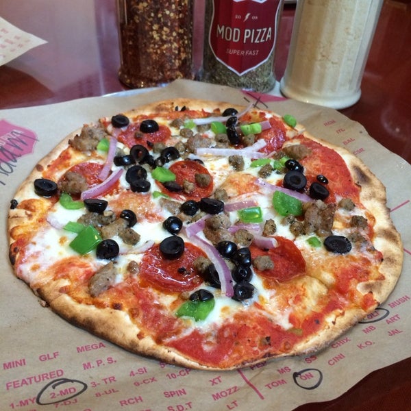 Photo taken at Mod Pizza by Adam G. on 1/17/2014