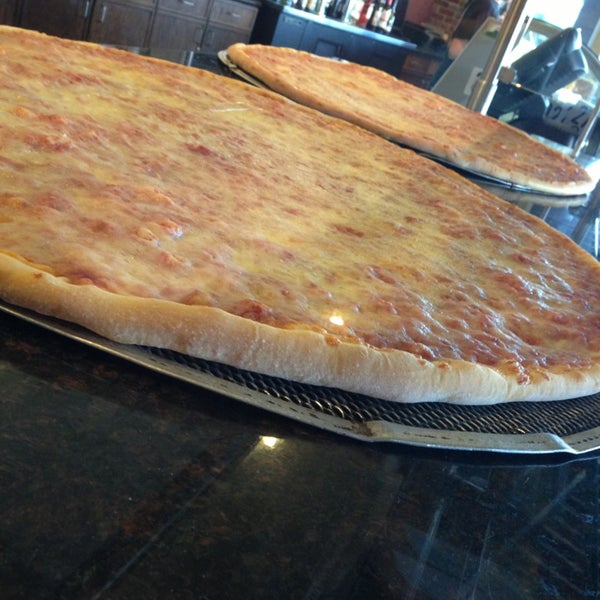 Photo taken at Russo&#39;s New York Pizzeria by Diem R. on 3/16/2013