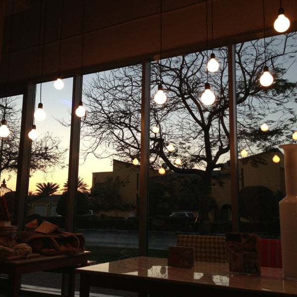 Photo taken at BookMunch Cafe by MiracleGirl on 2/22/2013