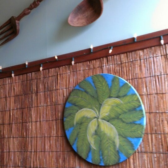 Photo taken at Bamboo Restaurant and Gallery by Jeanne D. on 8/4/2013