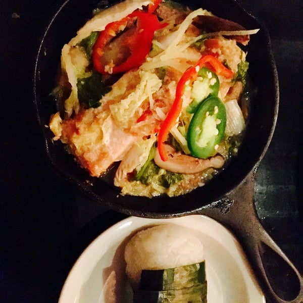 Poached salmon in a skillet with vegetables and sticky rice $22. Appetizer sampler is the right amount of 4 between 2 for $22. Book ahead.
