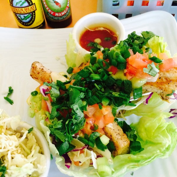 Signature grilled fish tacos made in lettuce cups, 2 for $14 or 3 for $17. Ask for their assortment of hot sauces to try some Cayman made ones
