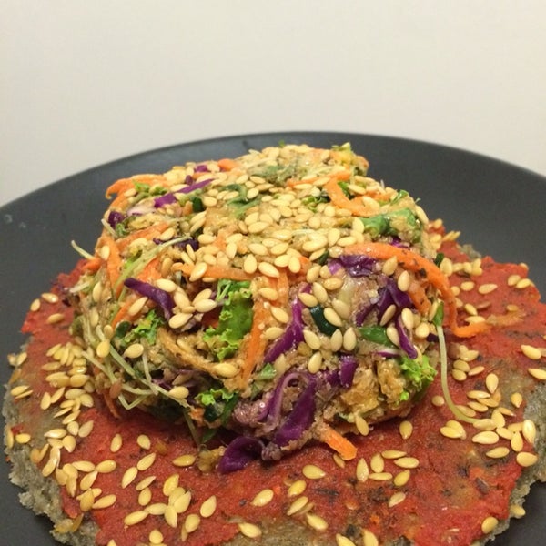 Get the house made raw vegan pizza $6.75. It converted me to having more raw foods. Never felt so energized afterwards.
