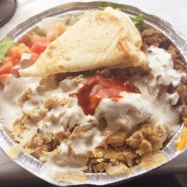 Photo taken at The Halal Guys by Nick P. on 1/5/2016