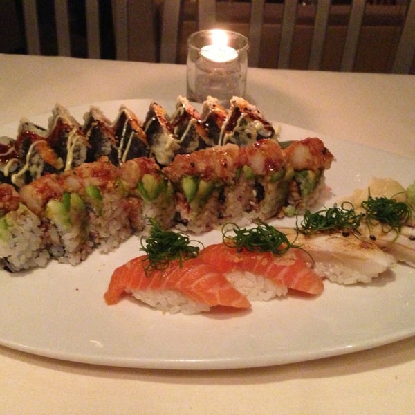 Photo taken at Uptown Sushi by A D. on 2/17/2013