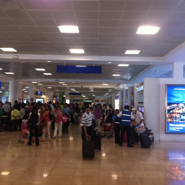 Photo taken at Cancun International Airport (CUN) by Favio G. on 4/26/2013