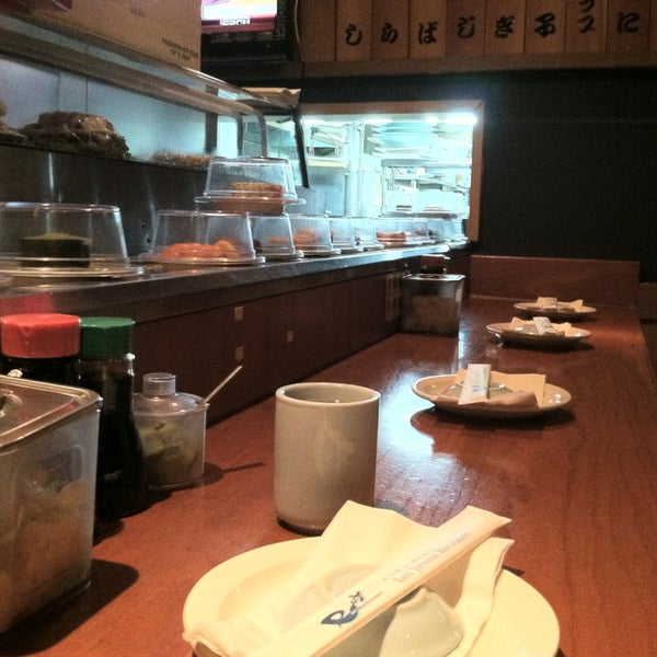 Photo taken at East Japanese Restaurant (Japas 27) by Tina L. on 5/24/2013