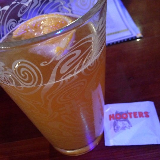 Photo taken at Hooters by Sandra C. on 12/15/2012