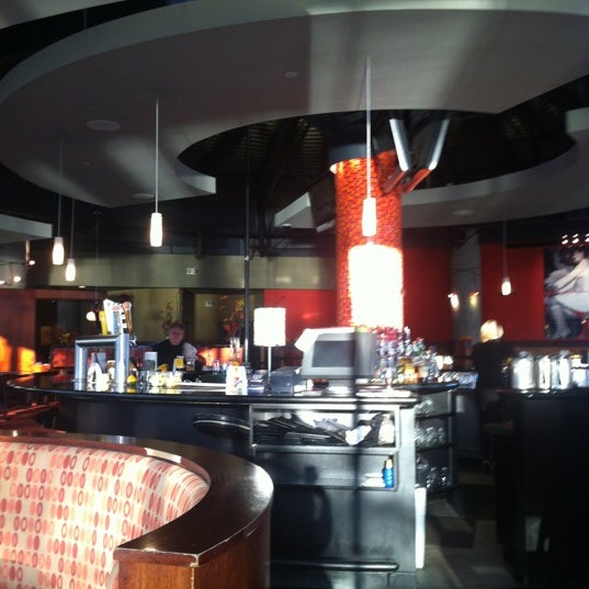 Photo taken at Glo Restaurant &amp; Lounge by Cori S. on 11/14/2012