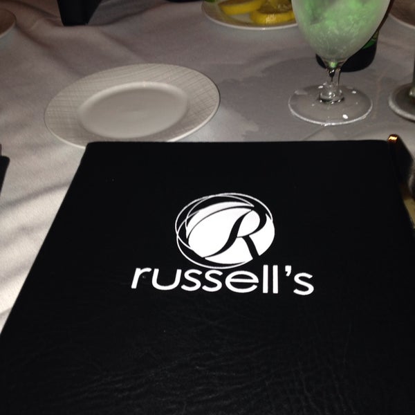 Photo taken at Russell&#39;s Steaks, Chops, &amp; More by Eduardo P. on 6/3/2014