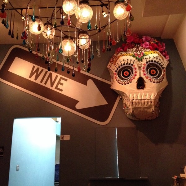 Photo taken at La Movida Wine Bar &amp; Community Kitchen by Mark P. on 1/24/2014