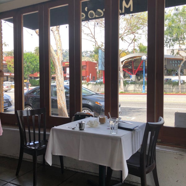 Photo taken at Marco&#39;s Trattoria by Sean F. on 4/15/2018