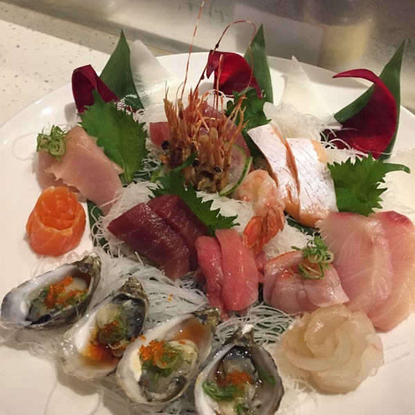 Photo taken at Yuubi Japanese Restaurant by Garret S. on 7/1/2015