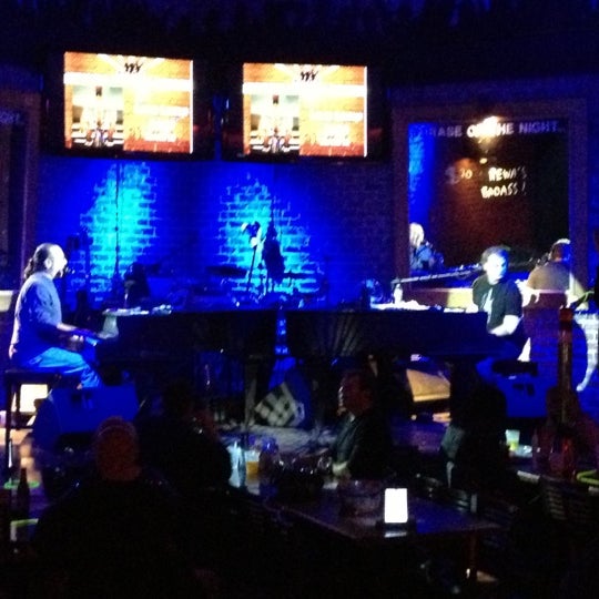 Photo taken at Bobby McKey&#39;s Dueling Piano Bar by Michelle B. on 10/13/2012