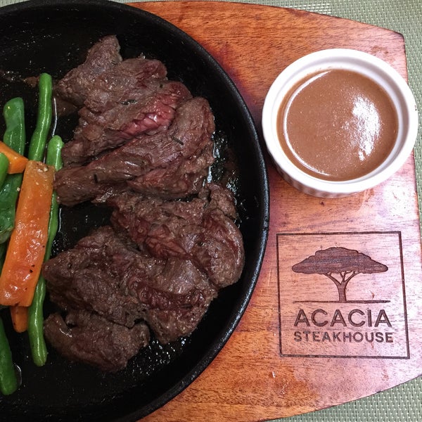 Photo taken at Acacia Steakhouse by Rianne on 5/12/2018