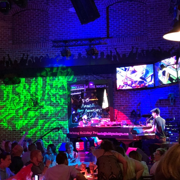 Photo taken at Bobby McKey&#39;s Dueling Piano Bar by Joshua on 9/2/2018