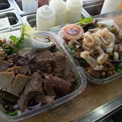 This Greek food truck, serves up gyros, meat platters & crispy seasoned fries. Try the combo platter: big chunks of chicken and lamb gyro over rice; douse with tzatziki, hot sauce and a side of pita.