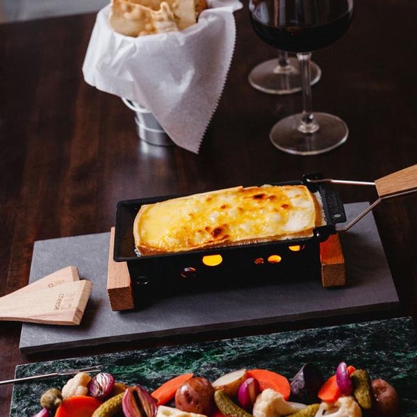 The Raclette comes served with the traditional potatoes and pickled vegetables, which you'll be grateful for when the dairy coma sets in.