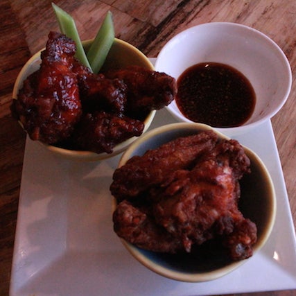 Recently opened Asian fusion restaurant offers candlelit tables, a backyard, & an intimate bar. Order the chicken wings, they come doused in your choice of spicy sauce or flecked with piquant ginger.