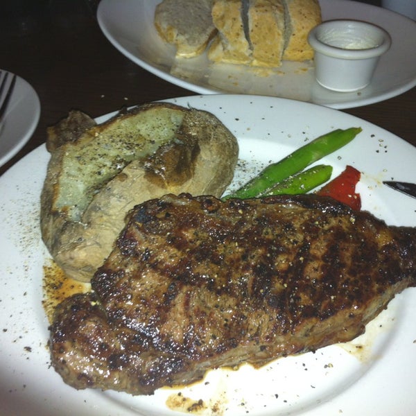 Photo taken at The Keg Steakhouse + Bar - St. James by Sonni F. on 8/25/2013